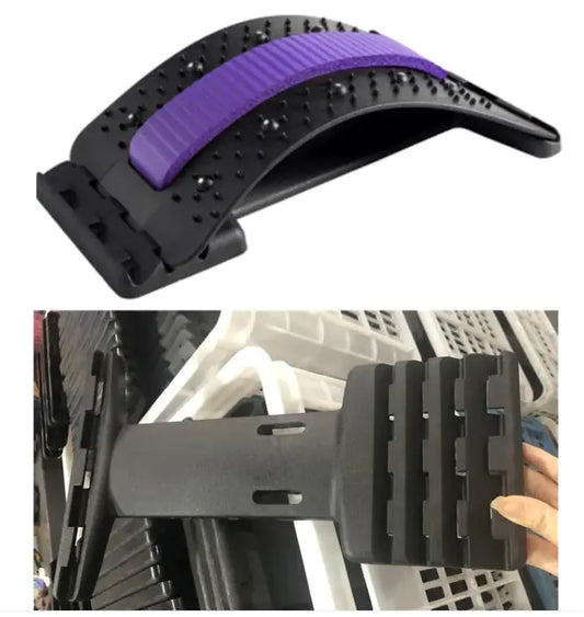 Black and purple bike seat with a close-up of a hand holding it.